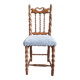 Chaise vintage en bois sculpté