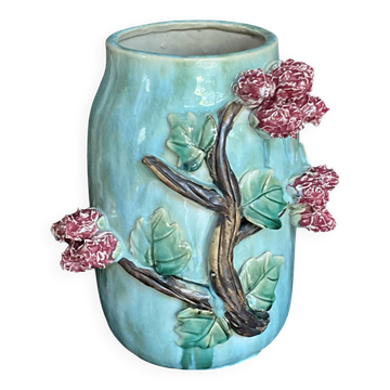 Large turquoise ceramic vase Athezza with raised floral decoration.