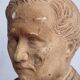 Bust of a notable in terracotta, 29 cm, signed Pasquet, 1870, on a base.