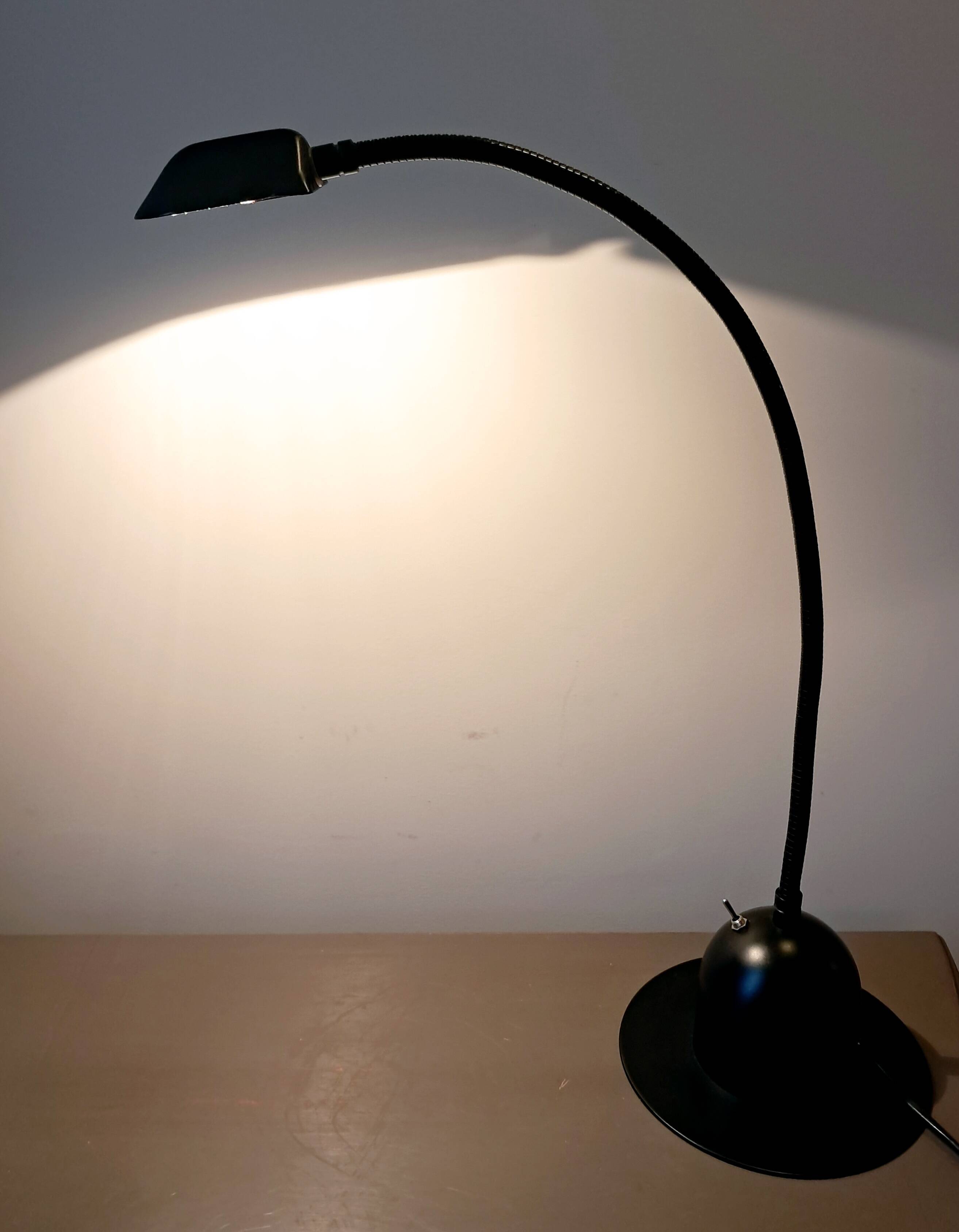 Articulated lamp in black metal. 80s