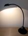 Articulated lamp in black metal. 80s