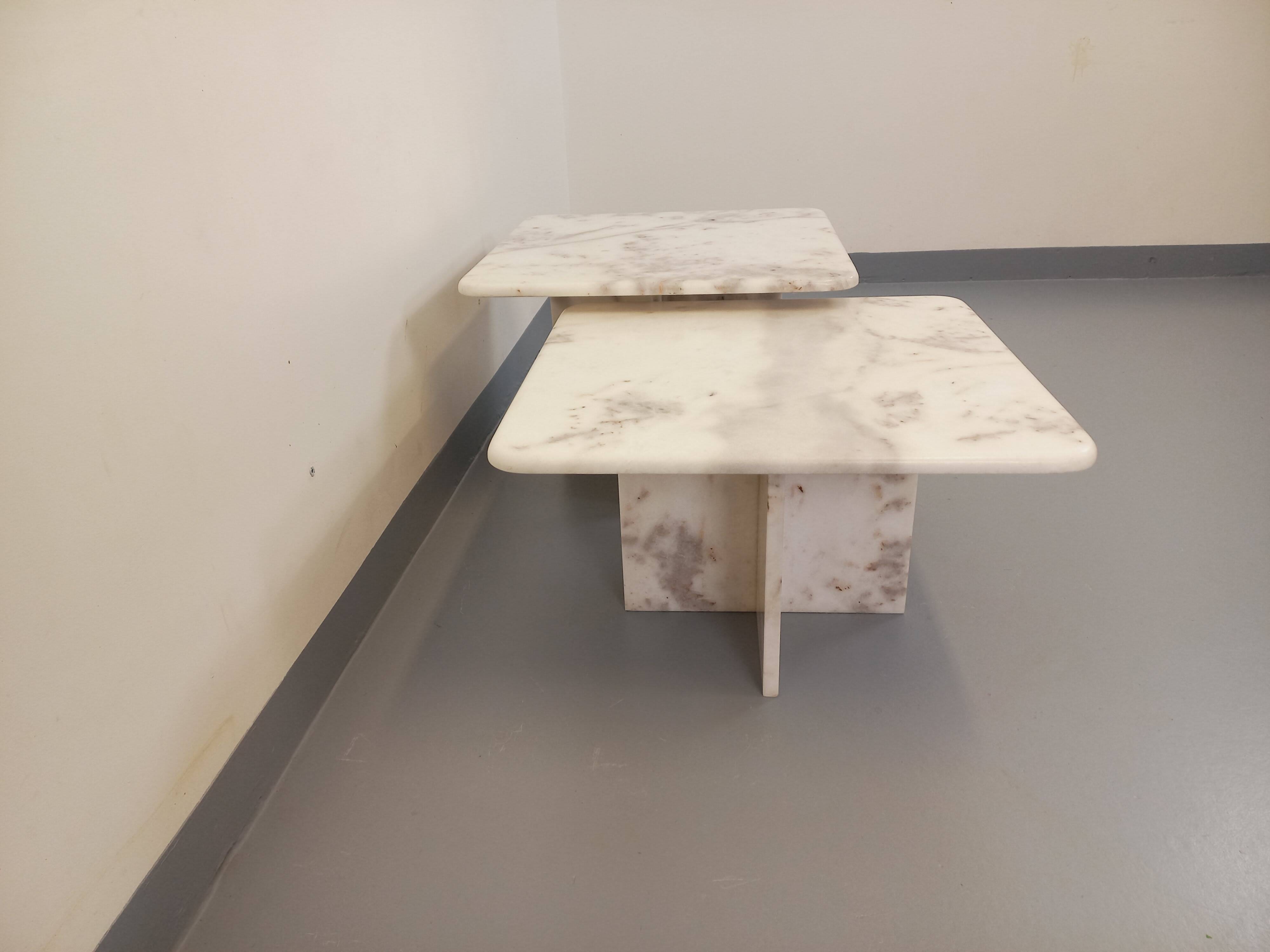Pair of vintage nesting coffee tables in white marble from the 1970s.