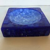 Blue mosaic pocket emptier