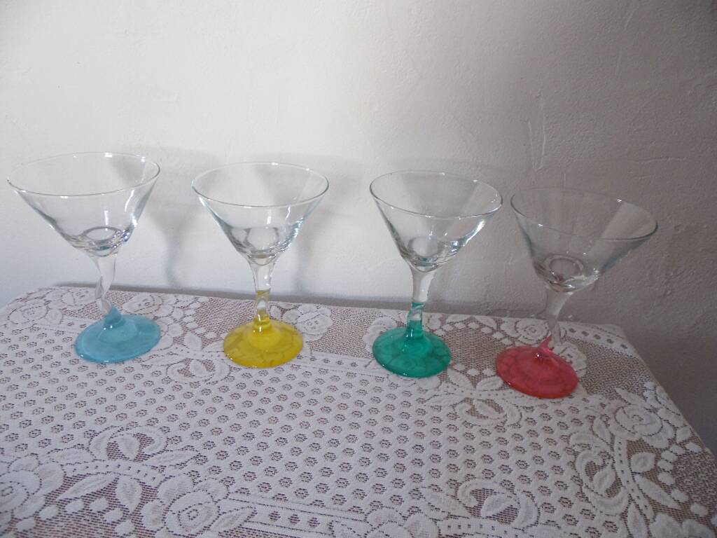 4 colored champagne glasses