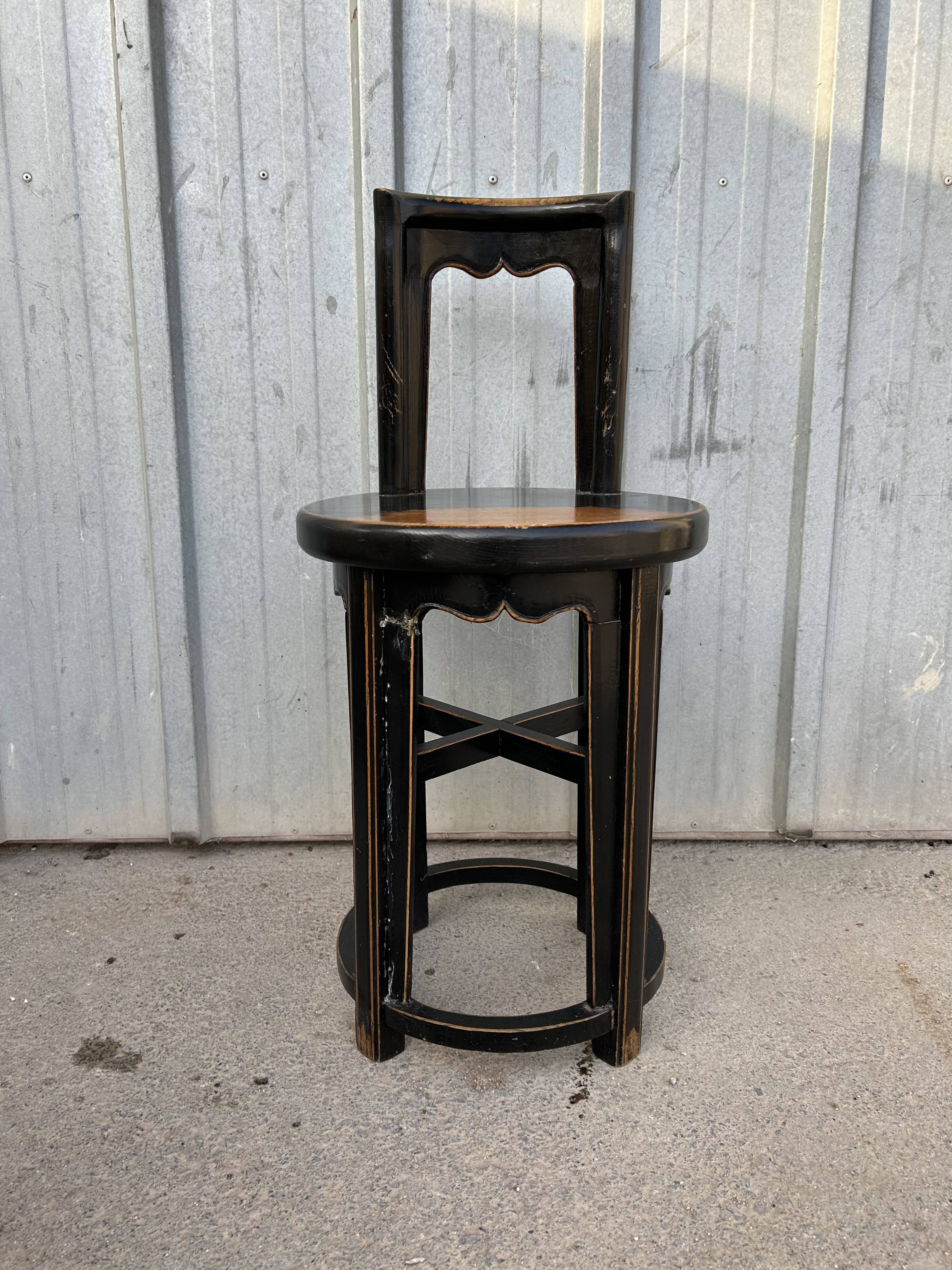 Antique Asian chair made of solid wood