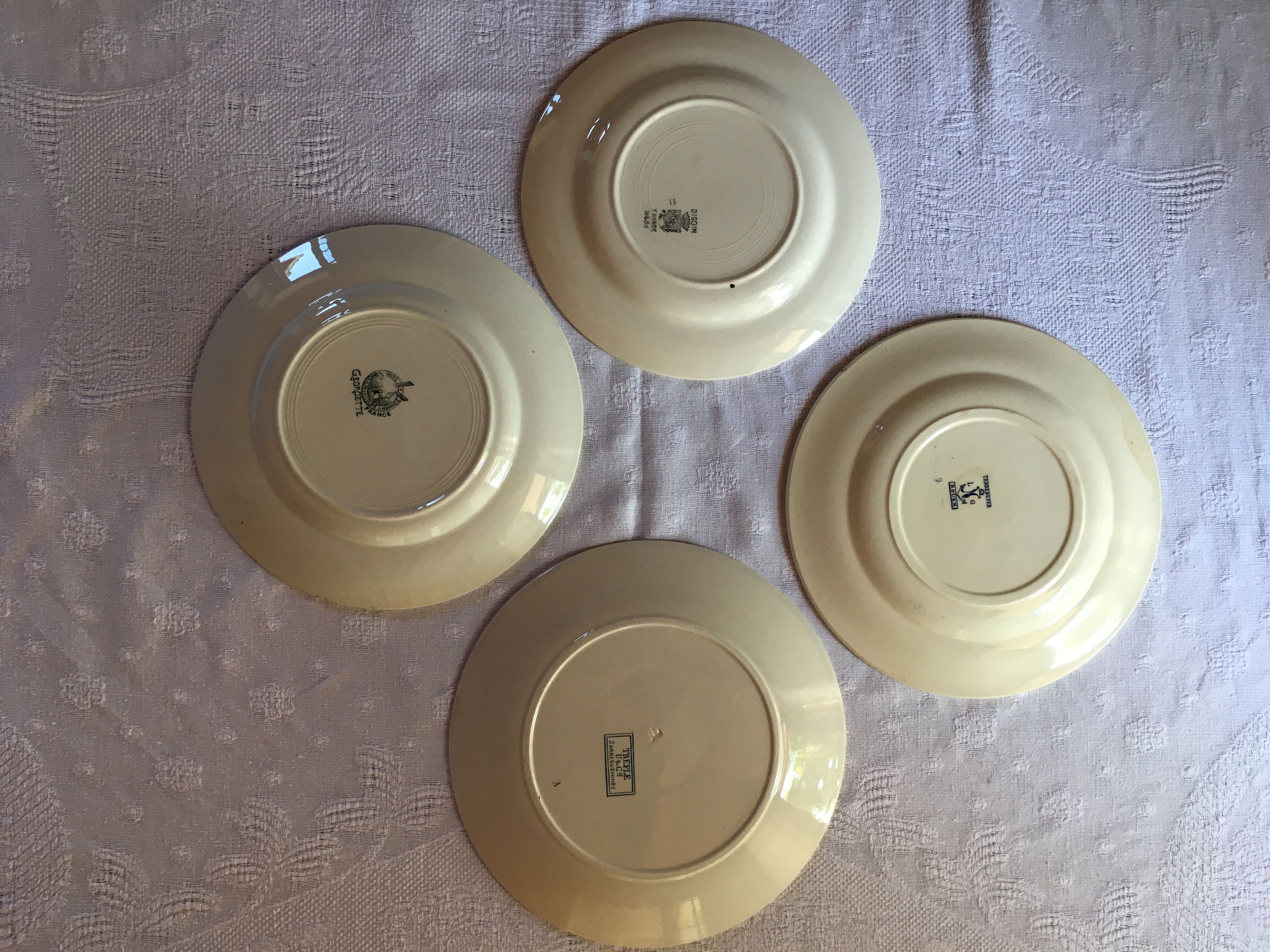 Set of 4 old plates with blue-green décor