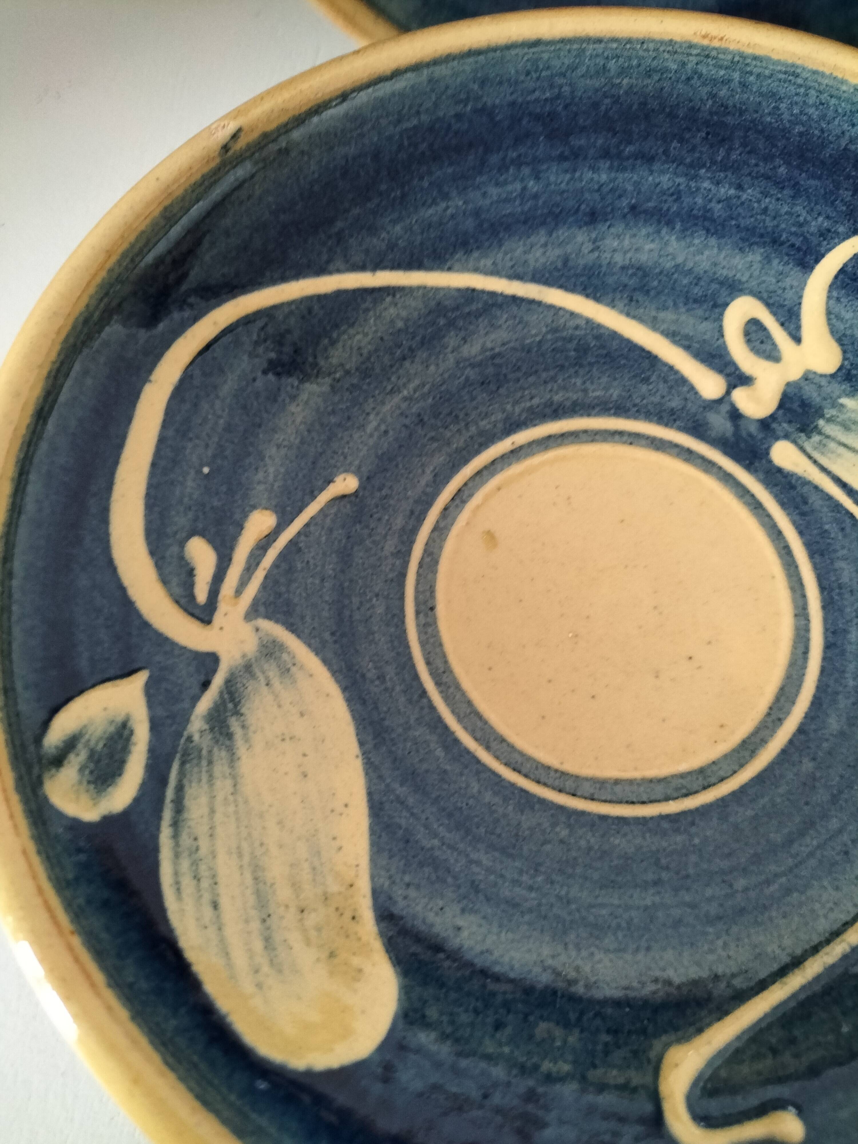 Pair of handcrafted bowls by Le Fer Rouge with blue and beige decor