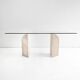 Dining table in travertine and glass with sculpted legs, 1970s.