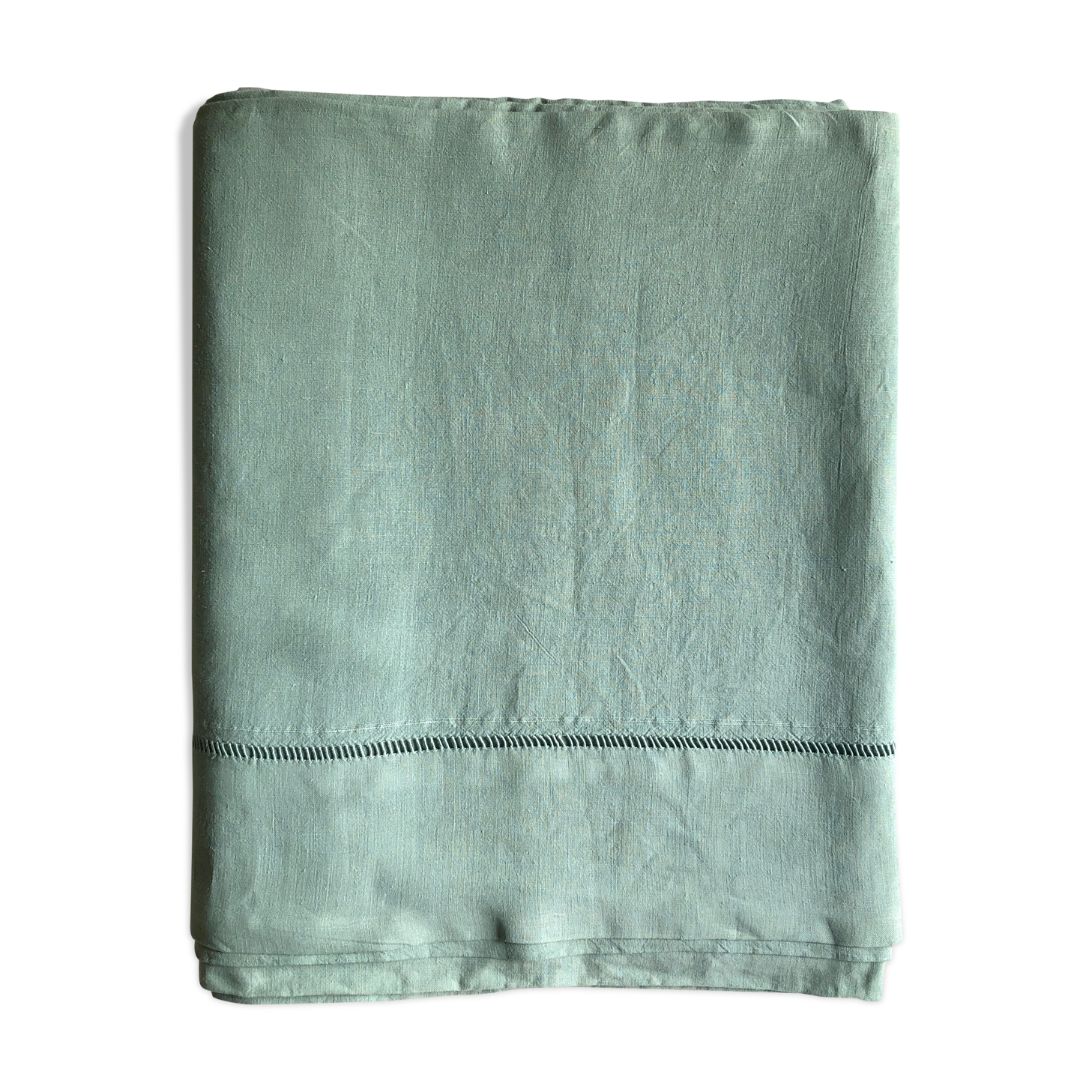 Old sheet in pure washed linen tinted in celadon green
