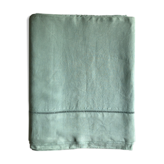 Old sheet in pure washed linen tinted in celadon green