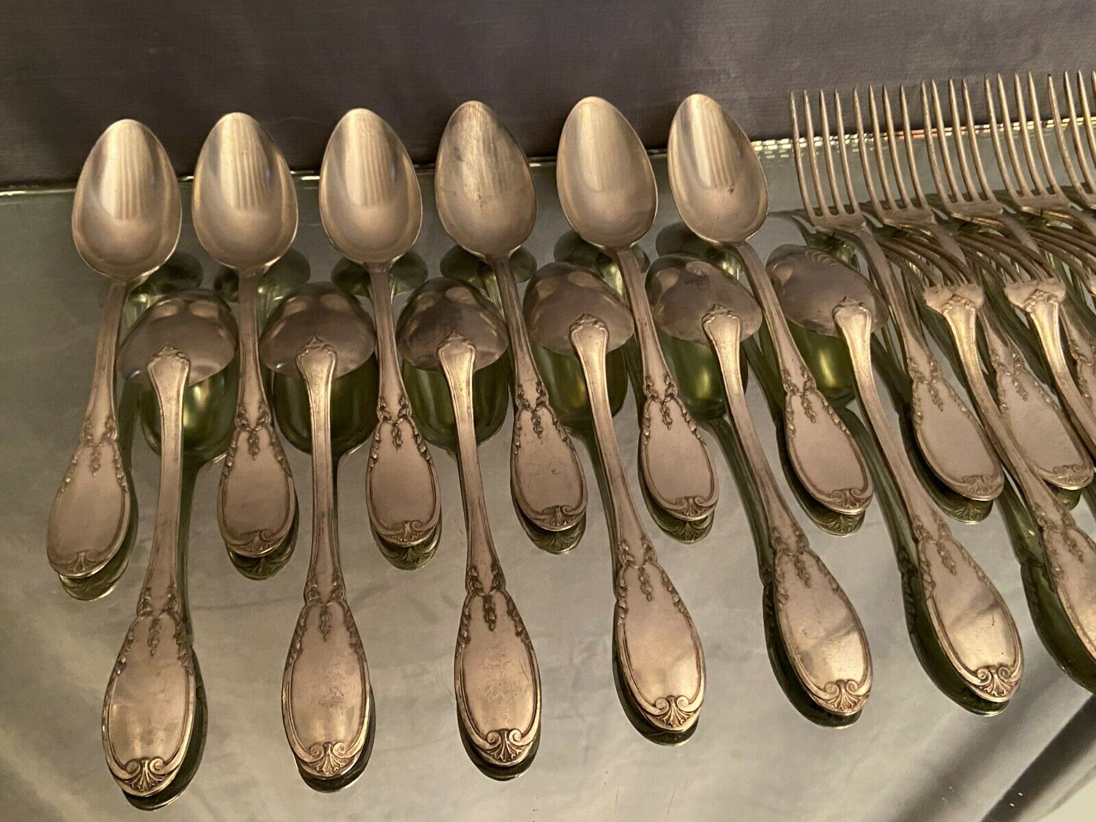 12 forks and 12 spoons in Louis XVI style metal