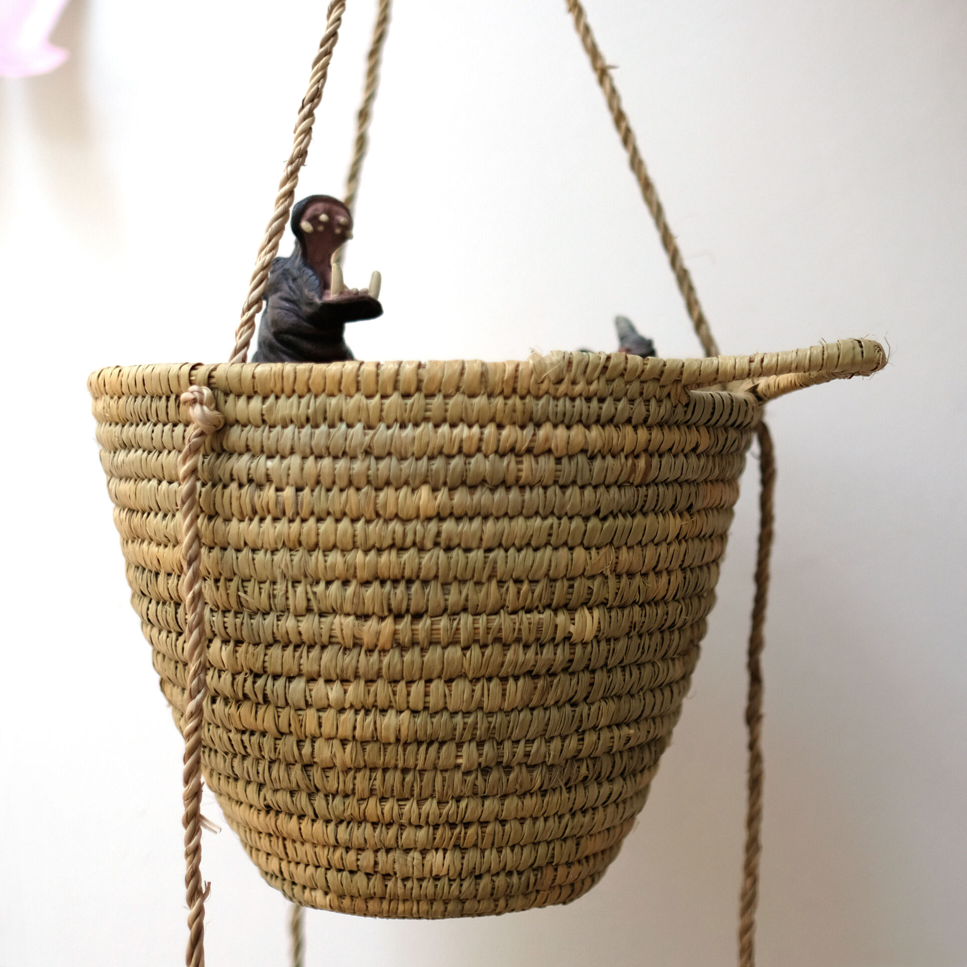 Hanging baskets made of natural fiber