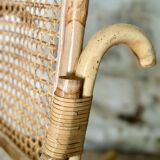 Rocking-chair en rotin et cannage
