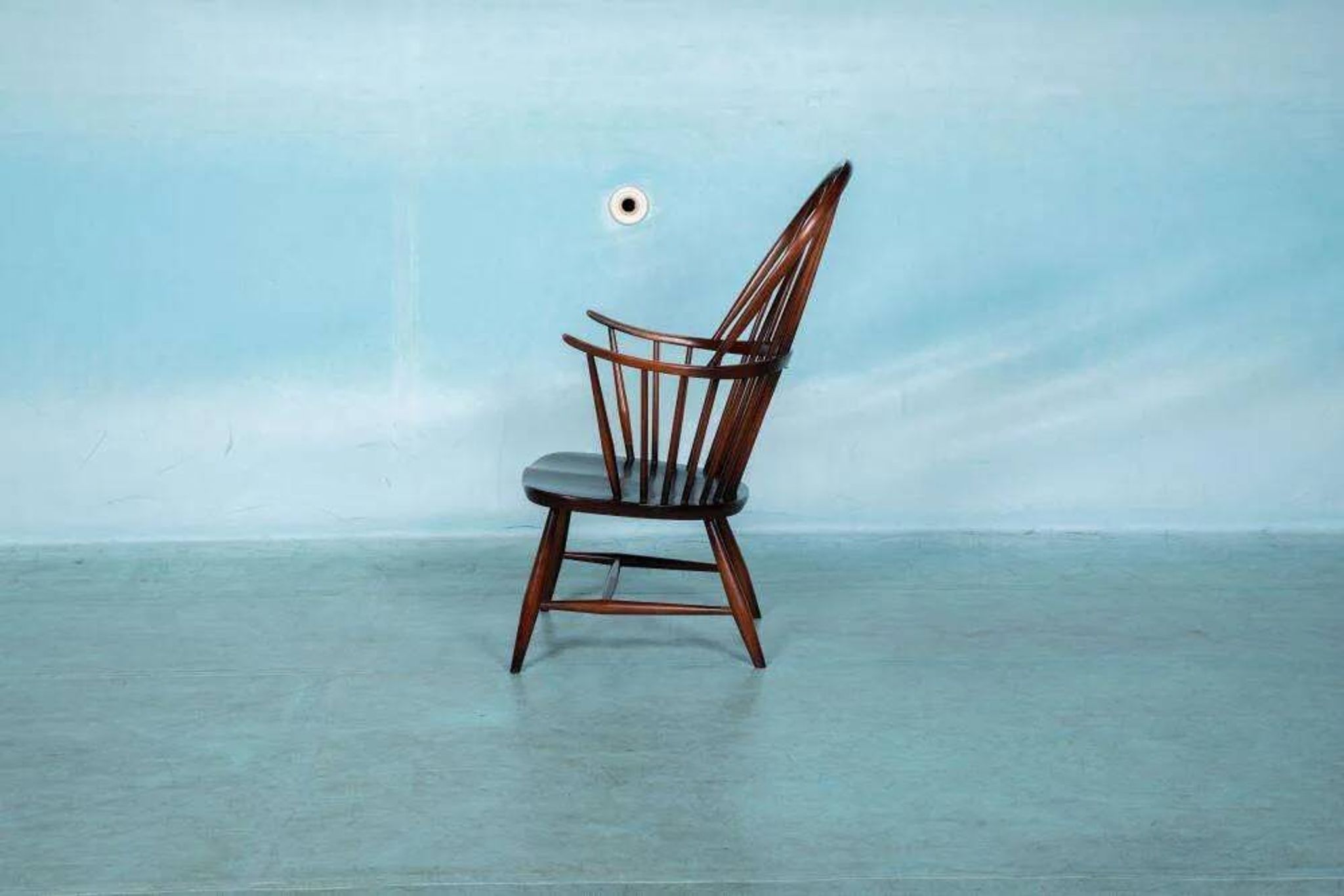 Ercol model 472 fireplace chair from the 1960s in beech.