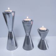 three "diabolo" aluminium design candle holders 90