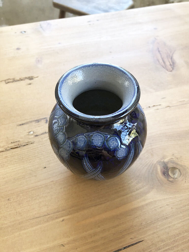 Artisan vase with floral motifs