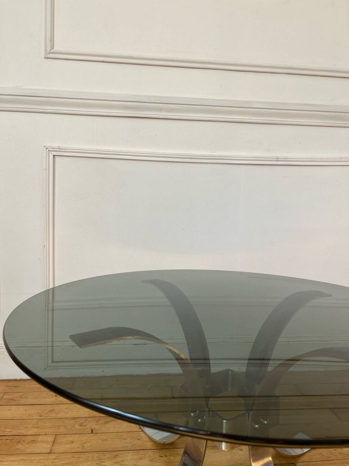 Round smoked glass coffee table from the 70s