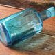 Large blown crystal bottle, twisted, turquoise blue, early 20th century.