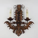 Pair of wrought iron sconces "Venetian masks"