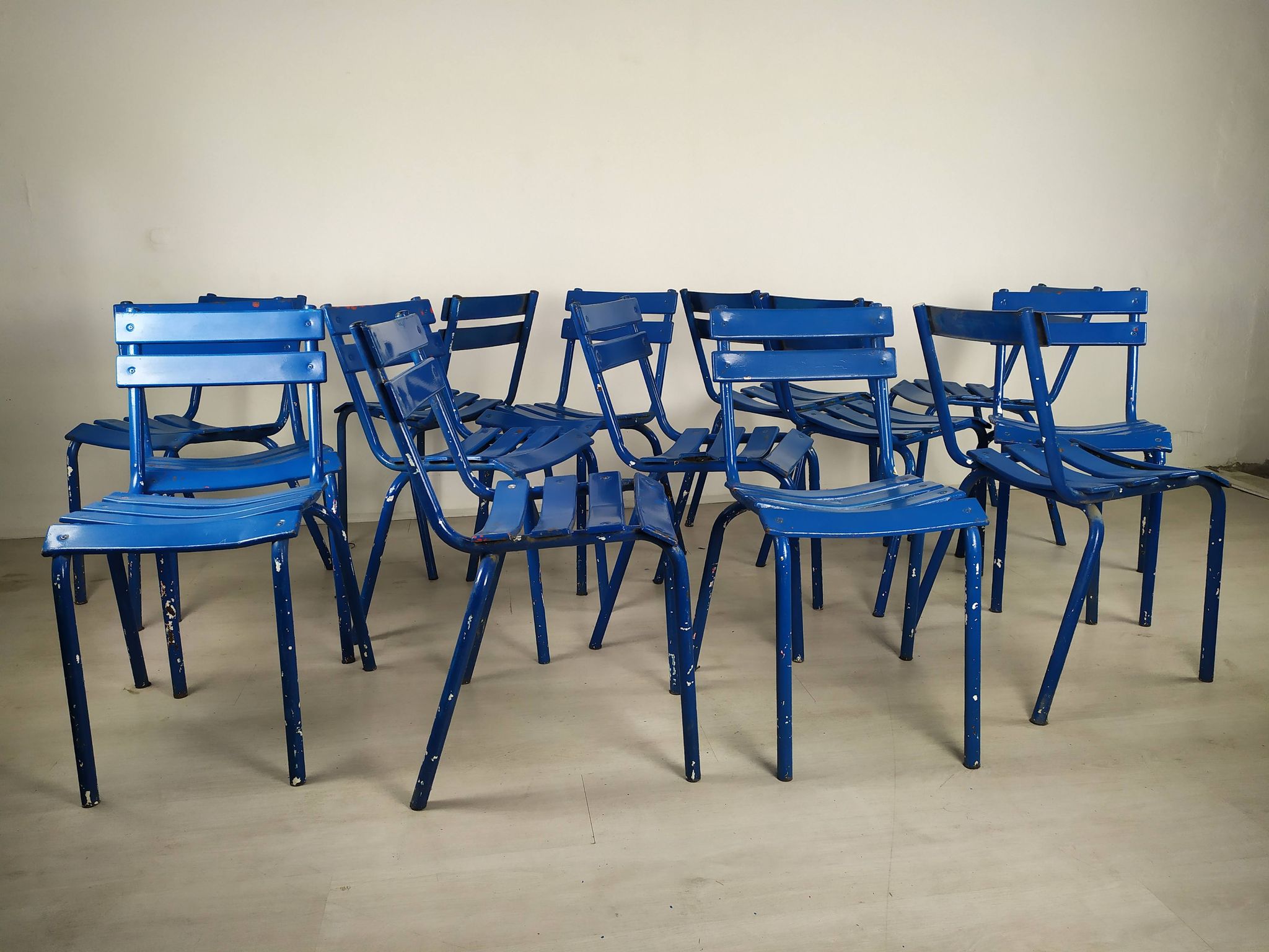 14 blue metal bistro chairs
