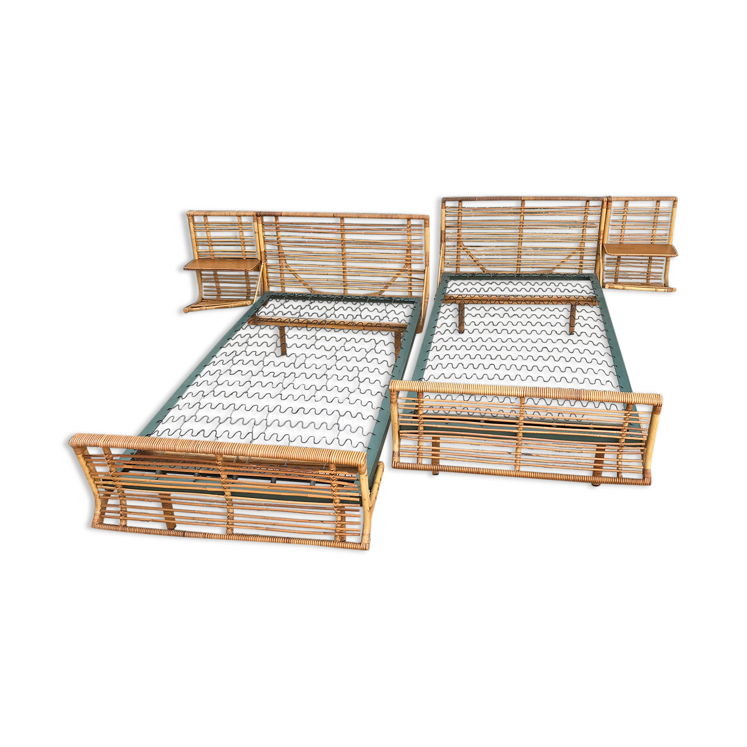 Twin rattan beds with built-in bedside tables