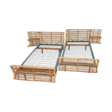 Twin rattan beds with built-in bedside tables