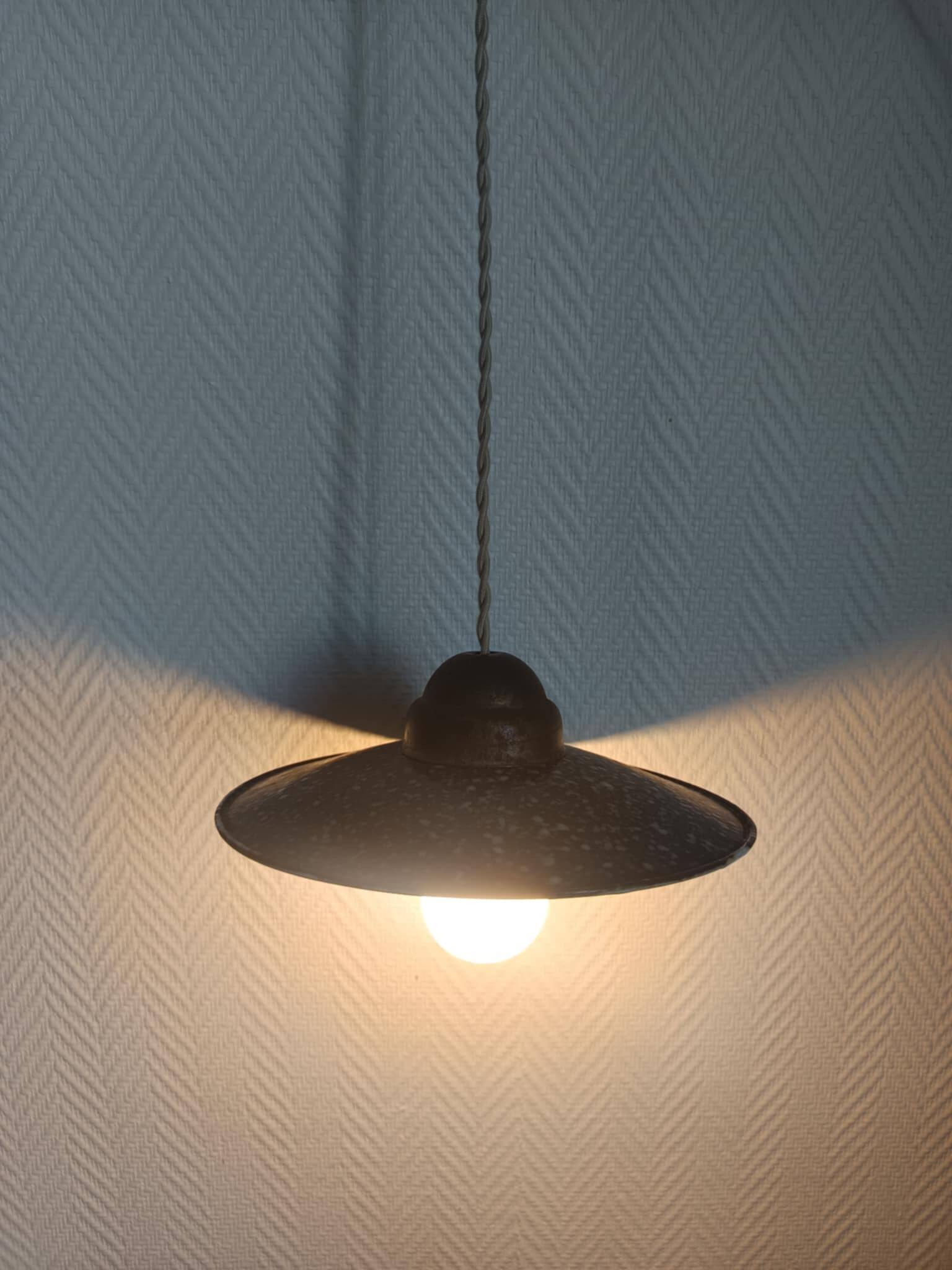 Pair of vintage enamelled sheet metal industrial pendant lights