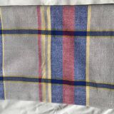 Light gray rectangle tablecloth with blue red yellow tiles