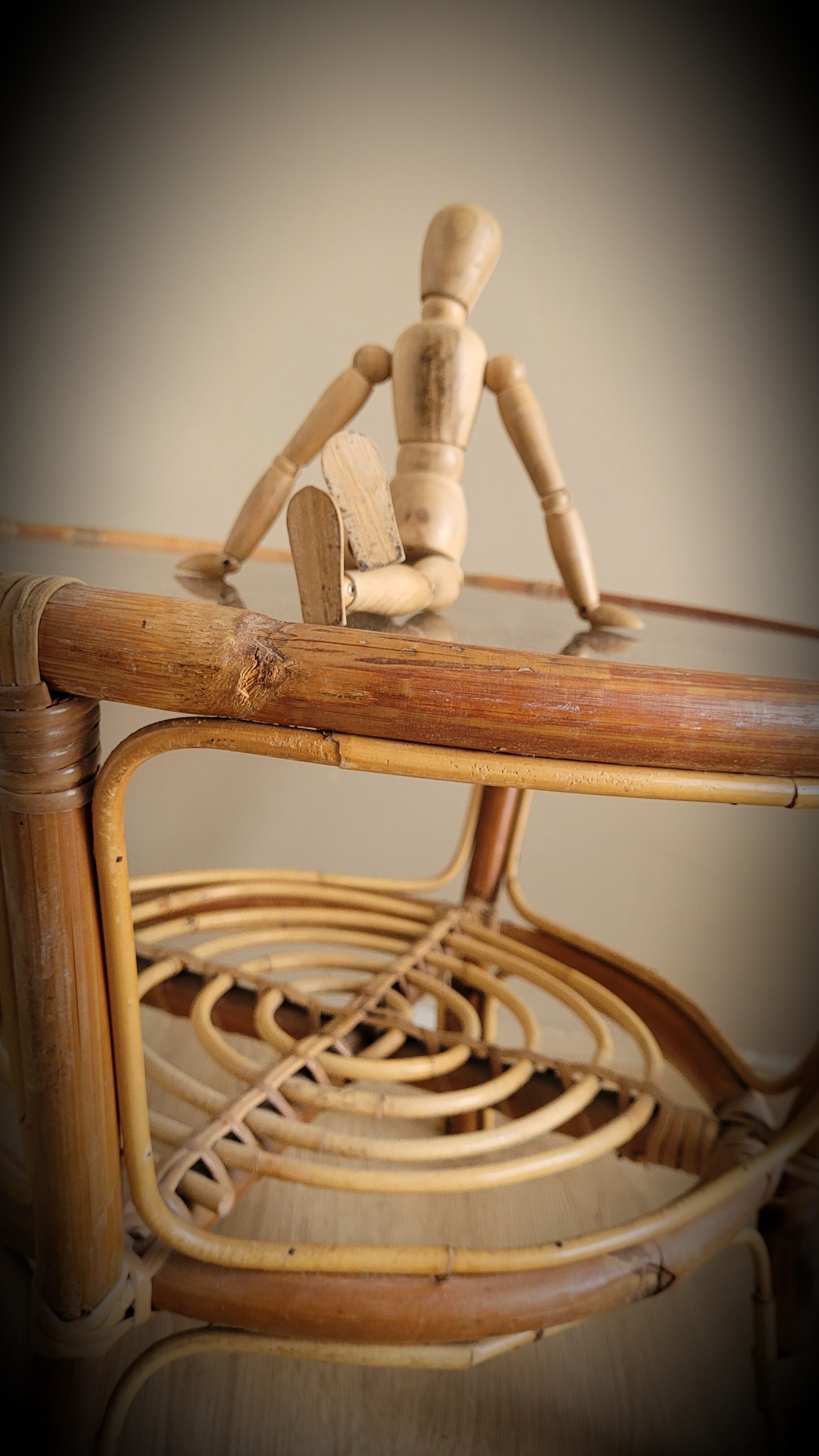 Light rattan lounge table and smoked glass