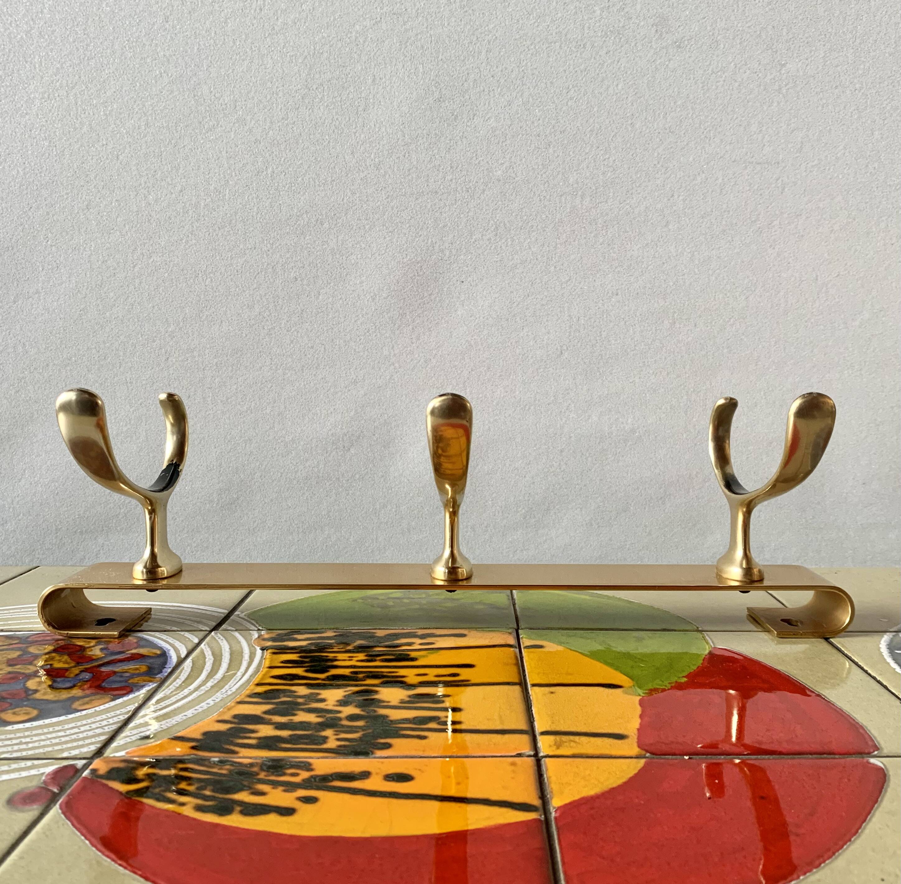 Vintage wall-mounted coat rack in golden aluminum - triple coat hook