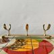 Vintage wall-mounted coat rack in golden aluminum - triple coat hook