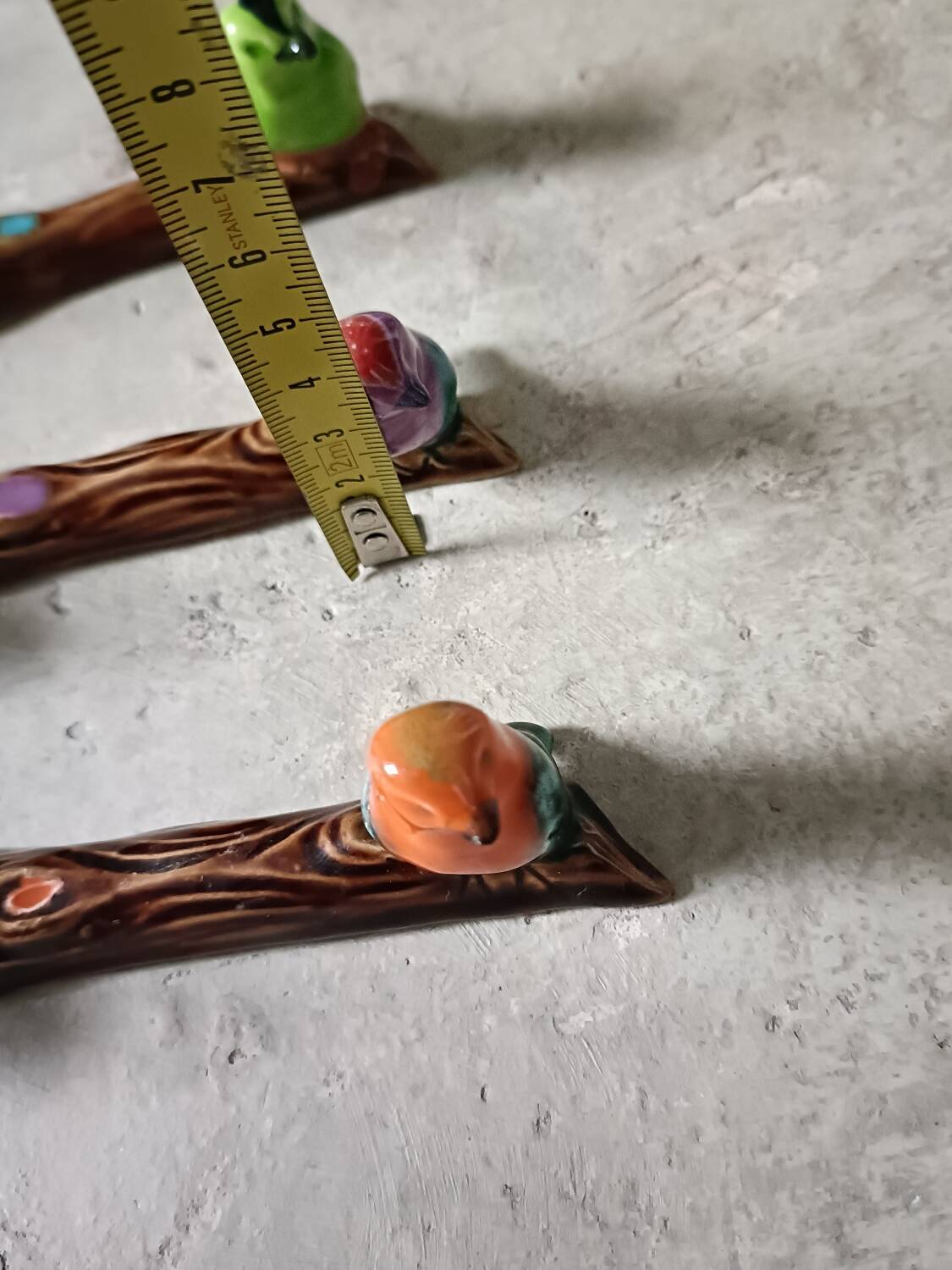 Set of six barbotine bird knife rests