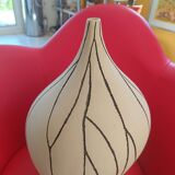 Designer vase in white ceramic with enamelled black stripes.