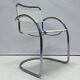 Vintage tubular frame chairs with white skai