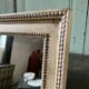 Mirror frame in white painted patinated wood