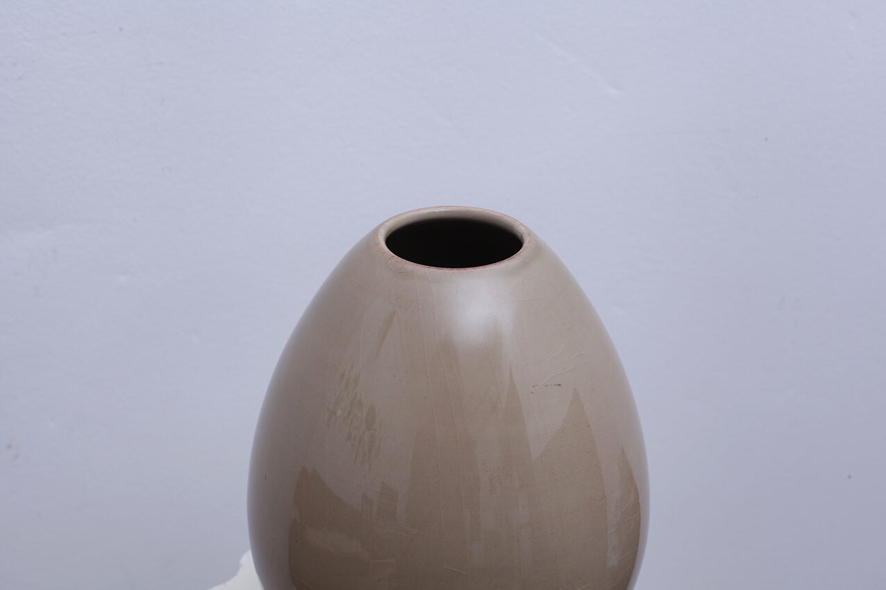 Beige ceramic vase egg shape