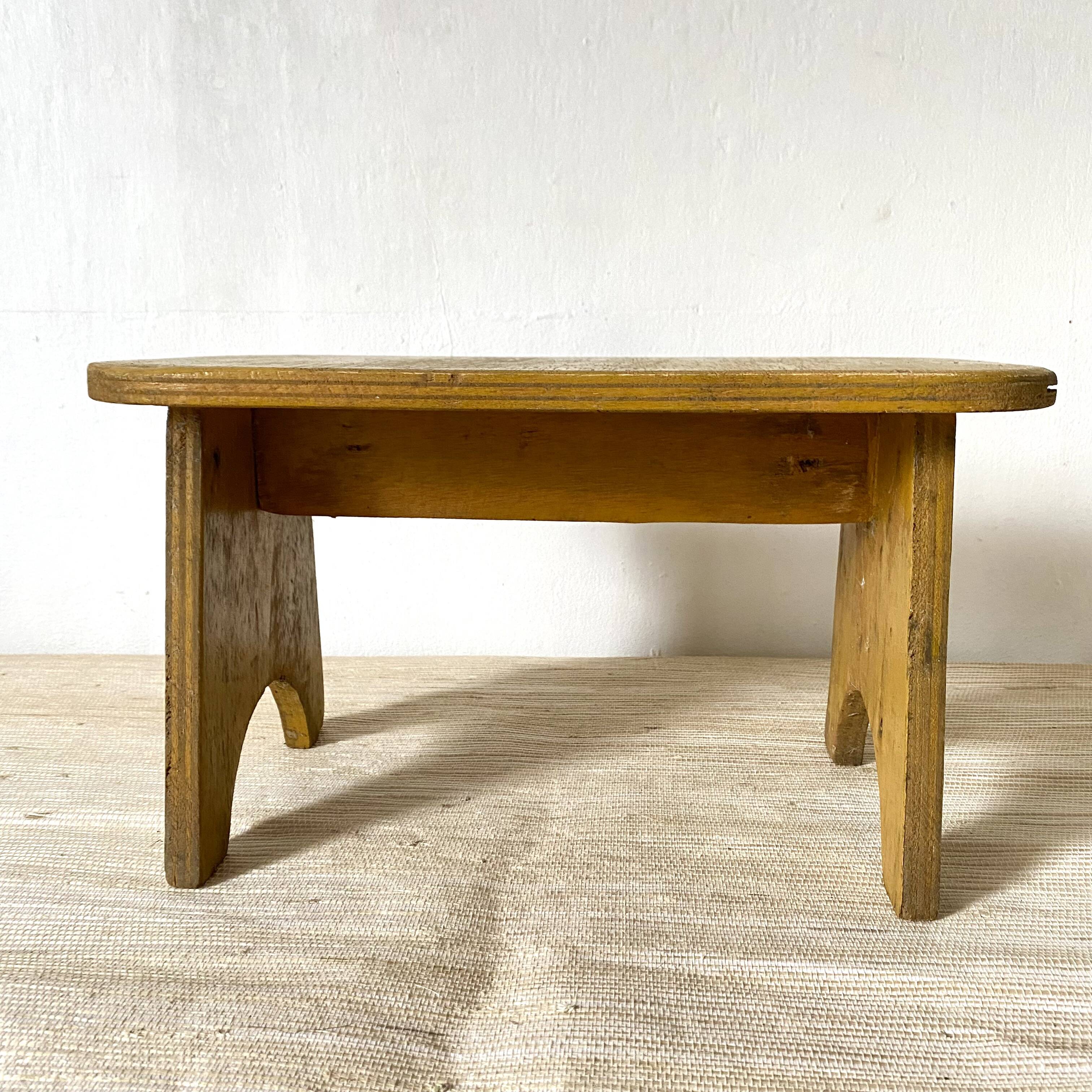 Low stool, plant stand in yellow painted wood