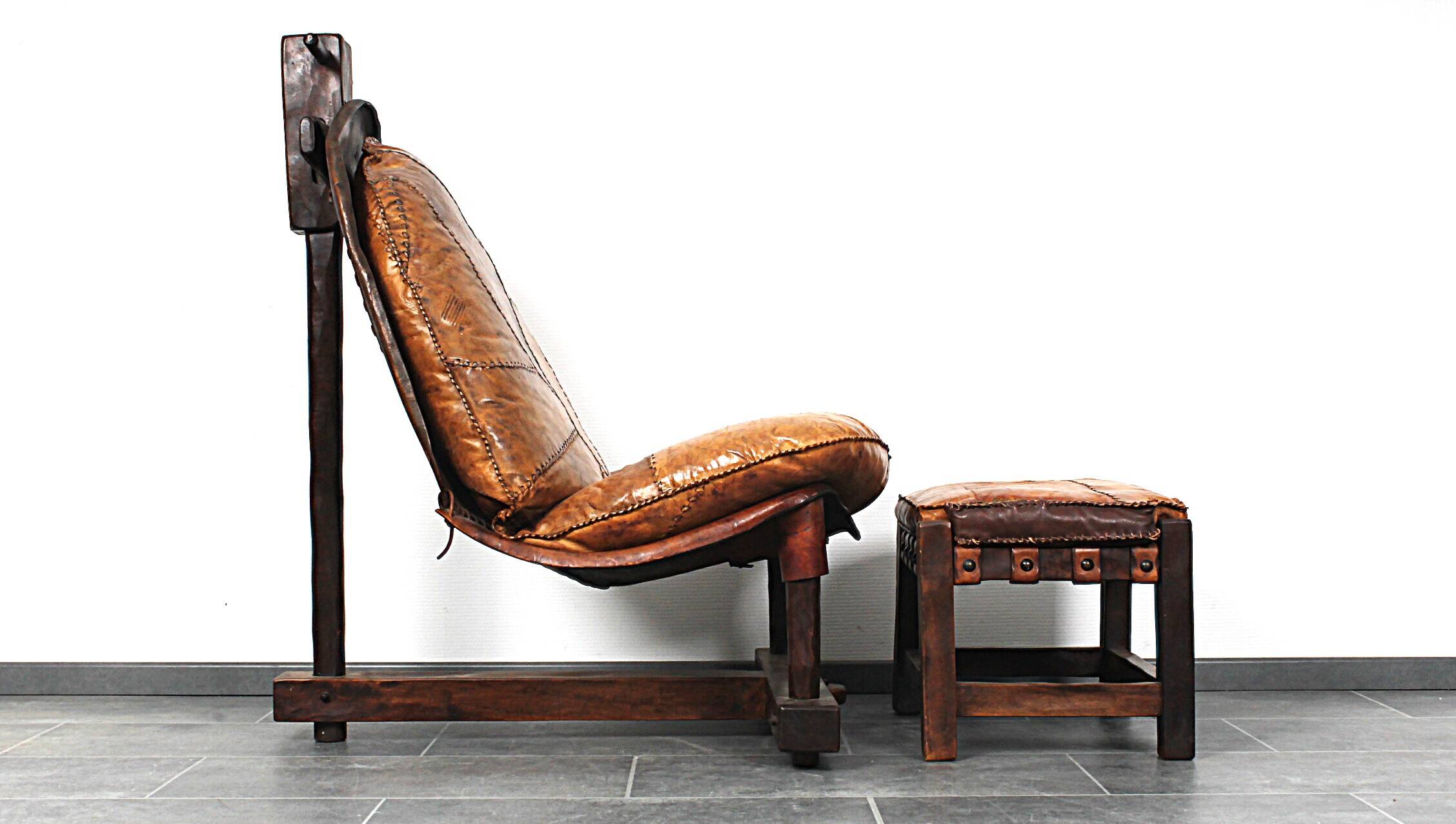 Brutalist oak lounge chair and ottoman, 1970s, set of 2