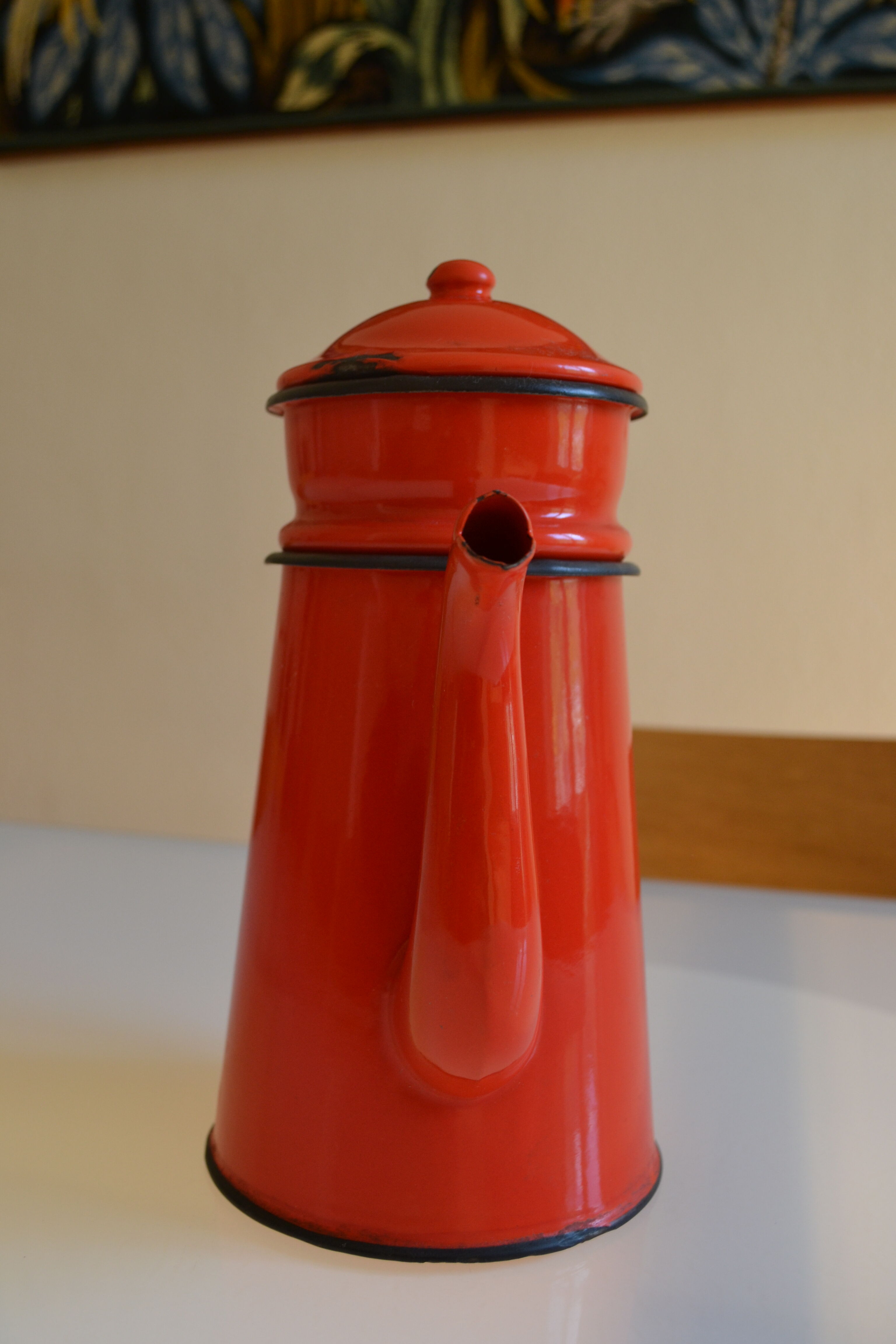 Vintage coffee maker in red and black enamelled sheet