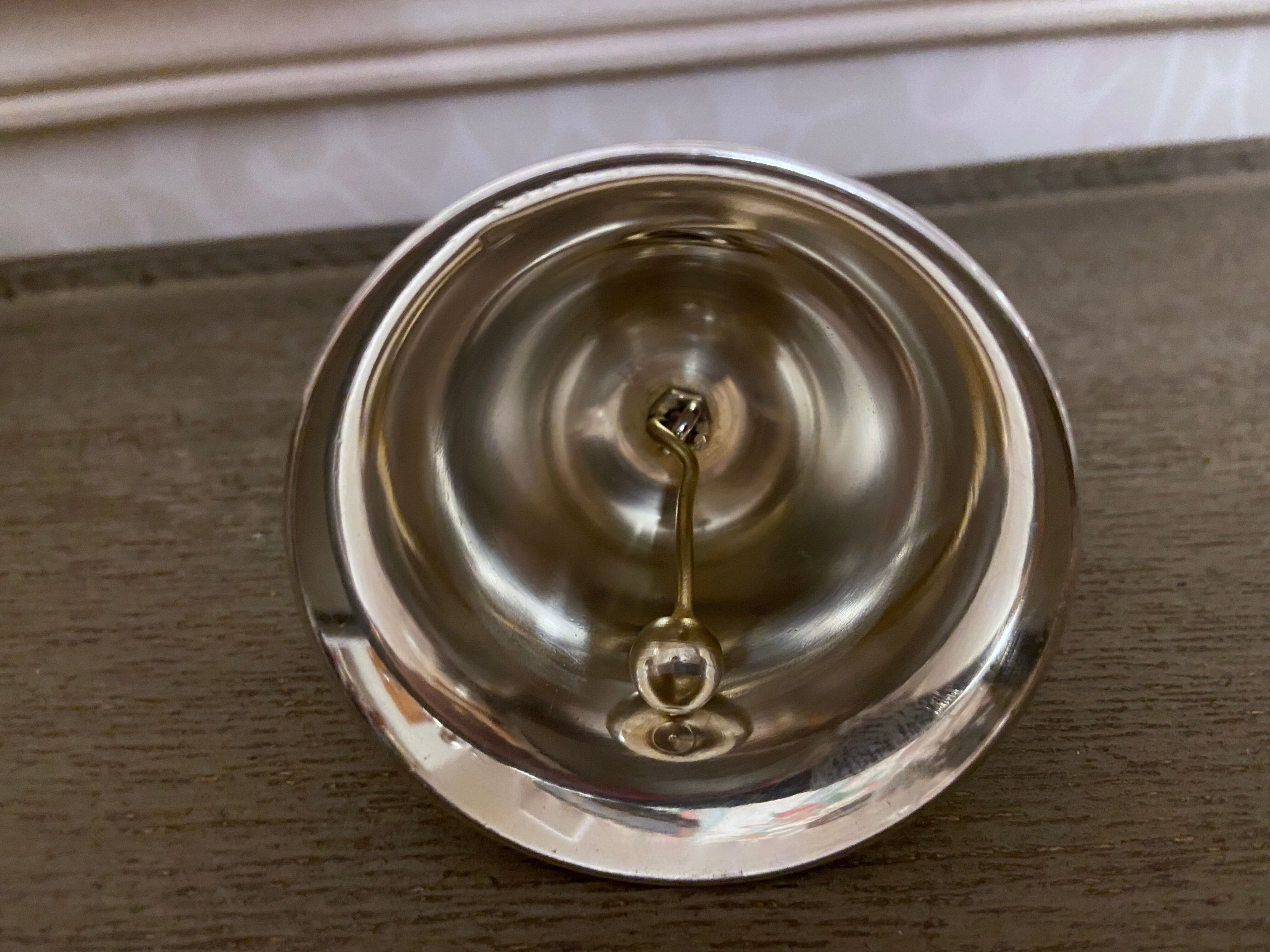 Small bell silver metal