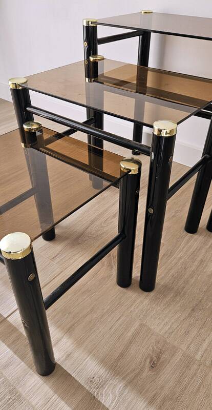 Set of 3 vintage nesting tables in smoked glass and black metal – 1970s