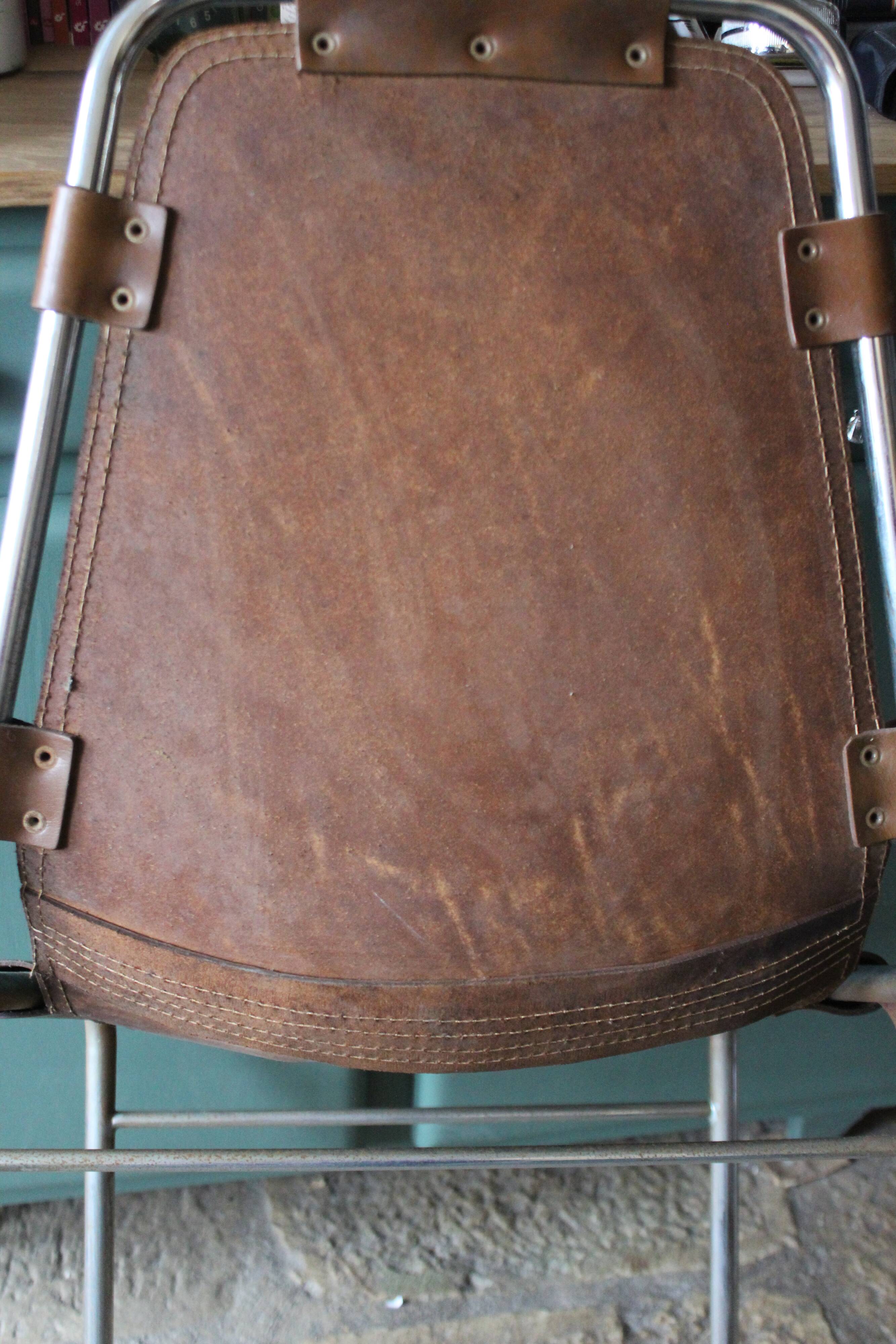 Leather and metal arch chairs