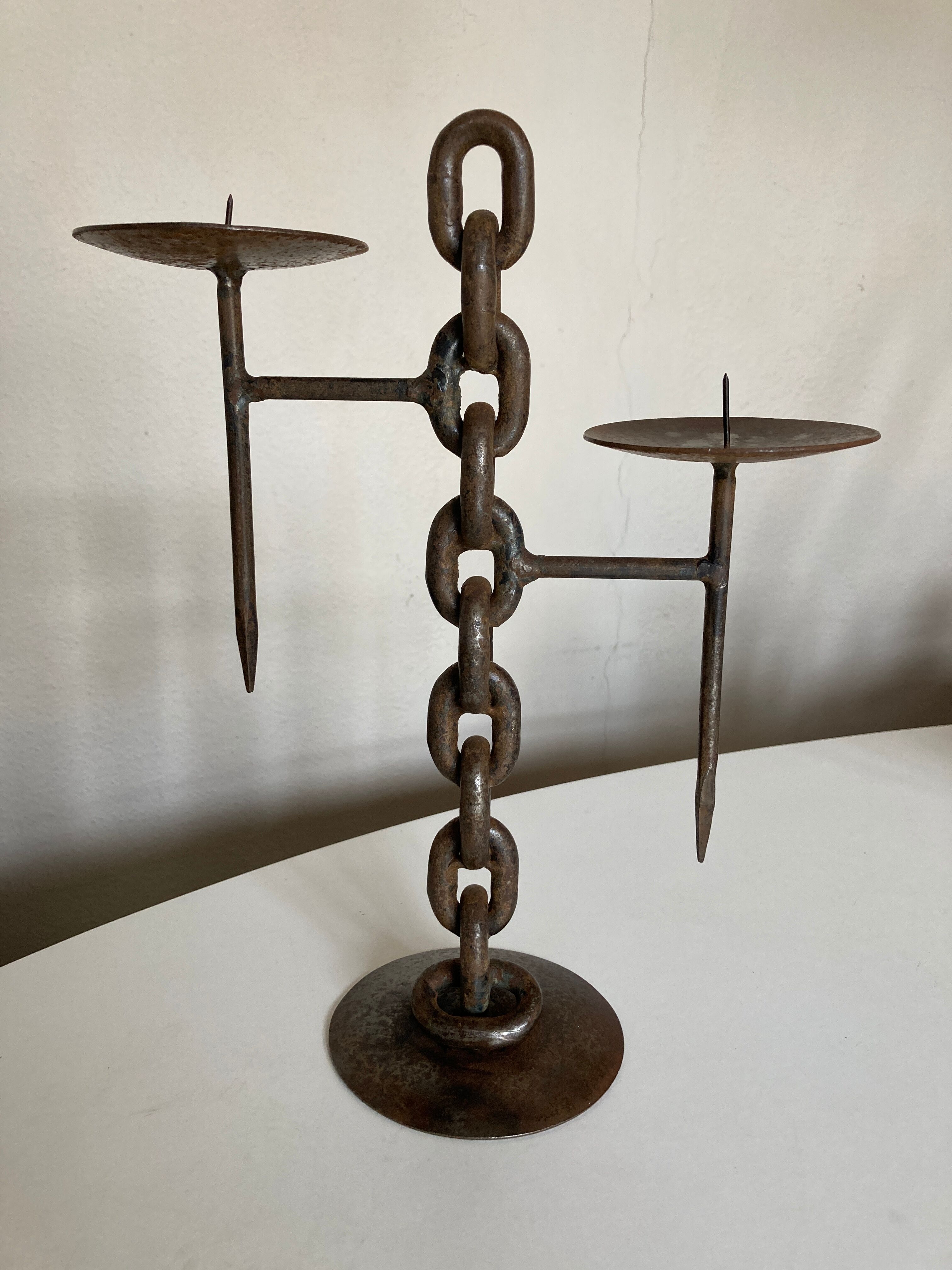 Raw beaten iron candlestick 1970