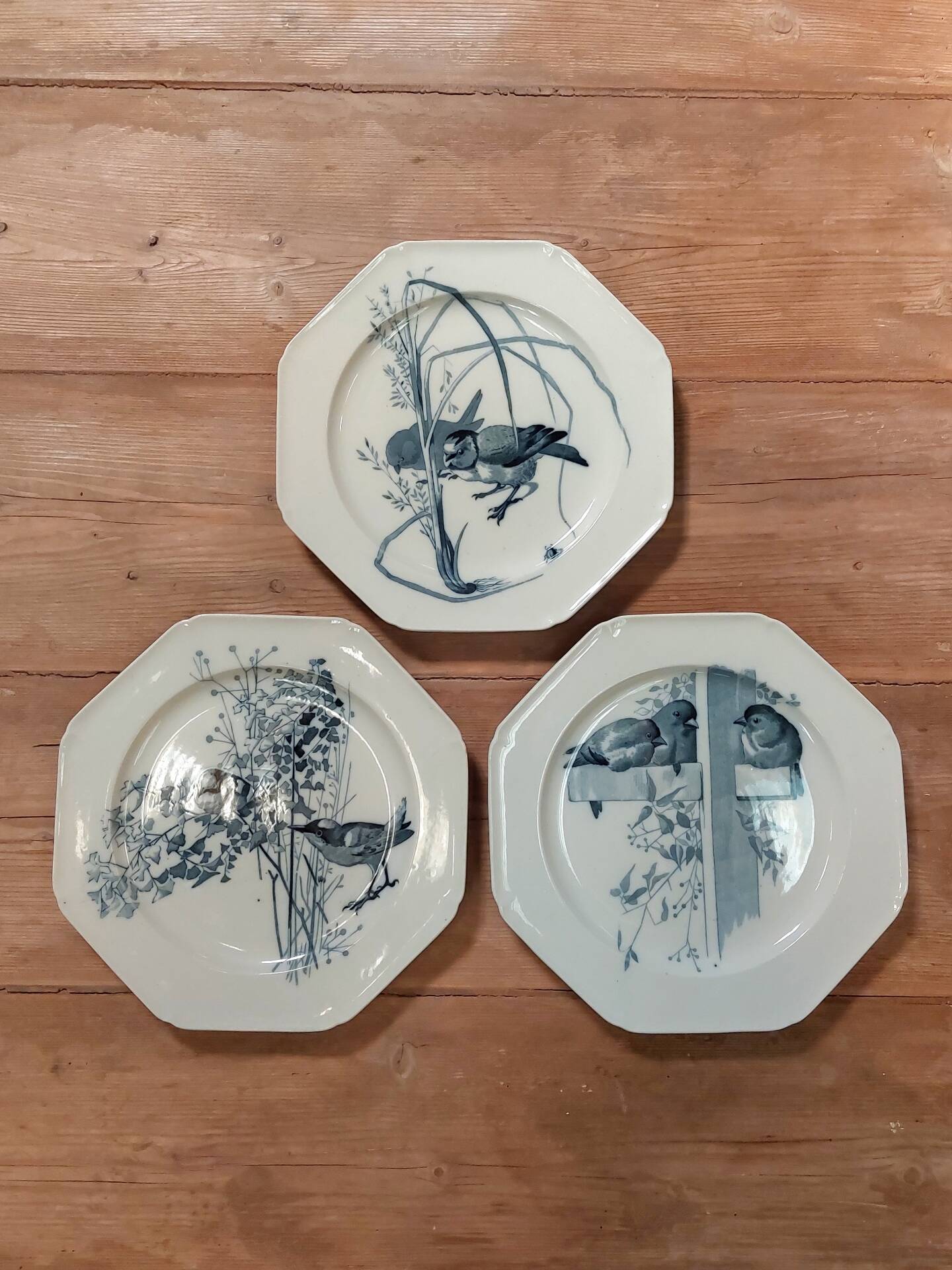 Set of three blue ironstone flat plates.