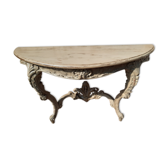 Former Louis XV style console sculpted and patinated.