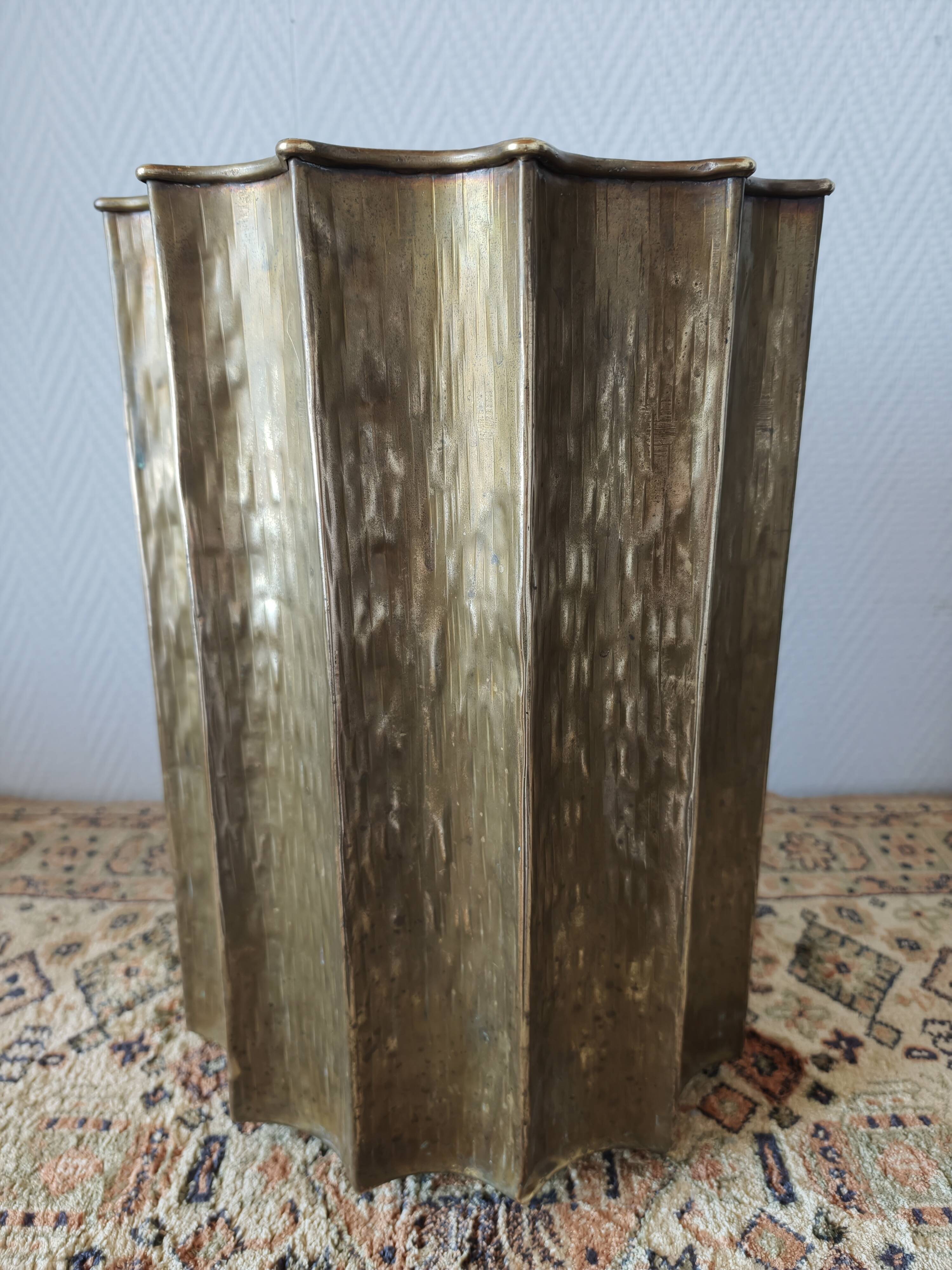 Egidio Casagrande umbrella stand in hammered brass, Italy, circa 1960.