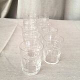 SUITE OF 11 GLASS SHOT GLASSES WITH SQUARE PATTERNS
