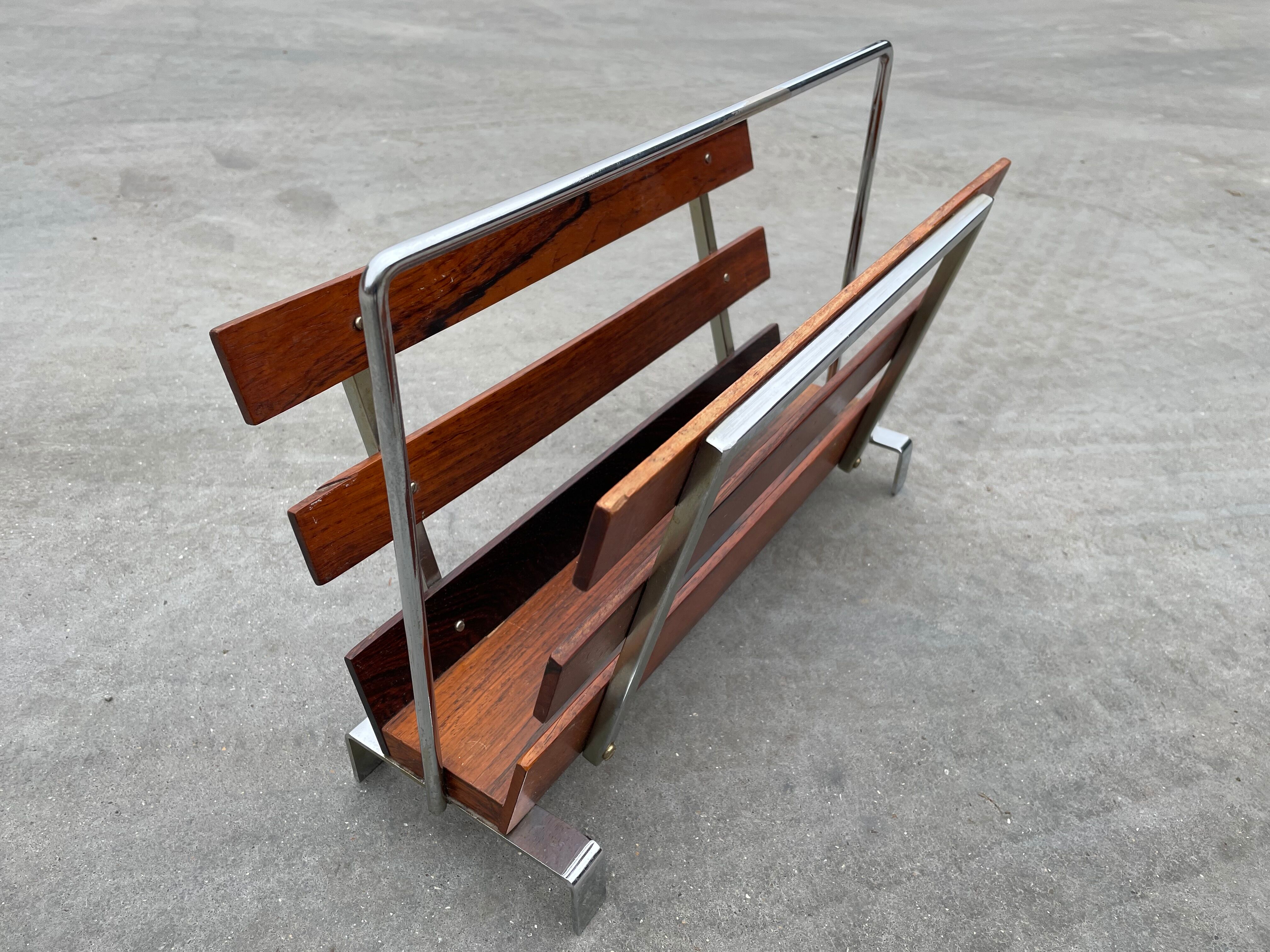 Vintage magazine rack from  rosewood and chrome design