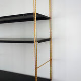Modular wall shelf in twisted brass