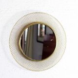 Vintage round mirror in gilded metal